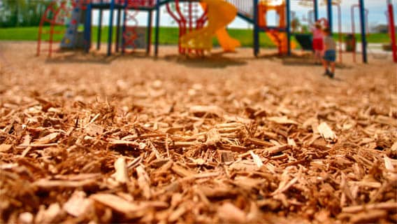 Engineered wood fiber playground surfacing